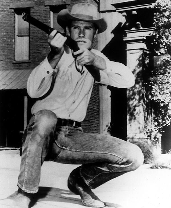 White hat: Chuck Connors, above, played Lucas McCain, a widower, Civil War veteran and homesteader in 1880s North Fork, New Mexico Territory. Connors, whose rapid-firing Winchester Model 1892 rifle sets him apart as the fastest gun in the West, is a single parent after his wife dies, and he devotes himself to raising his son, Mark McCain, played by Johnny Crawford, and helping Marshal Micah Torrance, played by Paul Fix, keep order. Black hat: McCain is constantly fending off gunfighters out to defeat the fastest shooter in the West. Other black hats are the cheaters, bigots and villains that keep the sometimes-bumbling marshal's hands full.