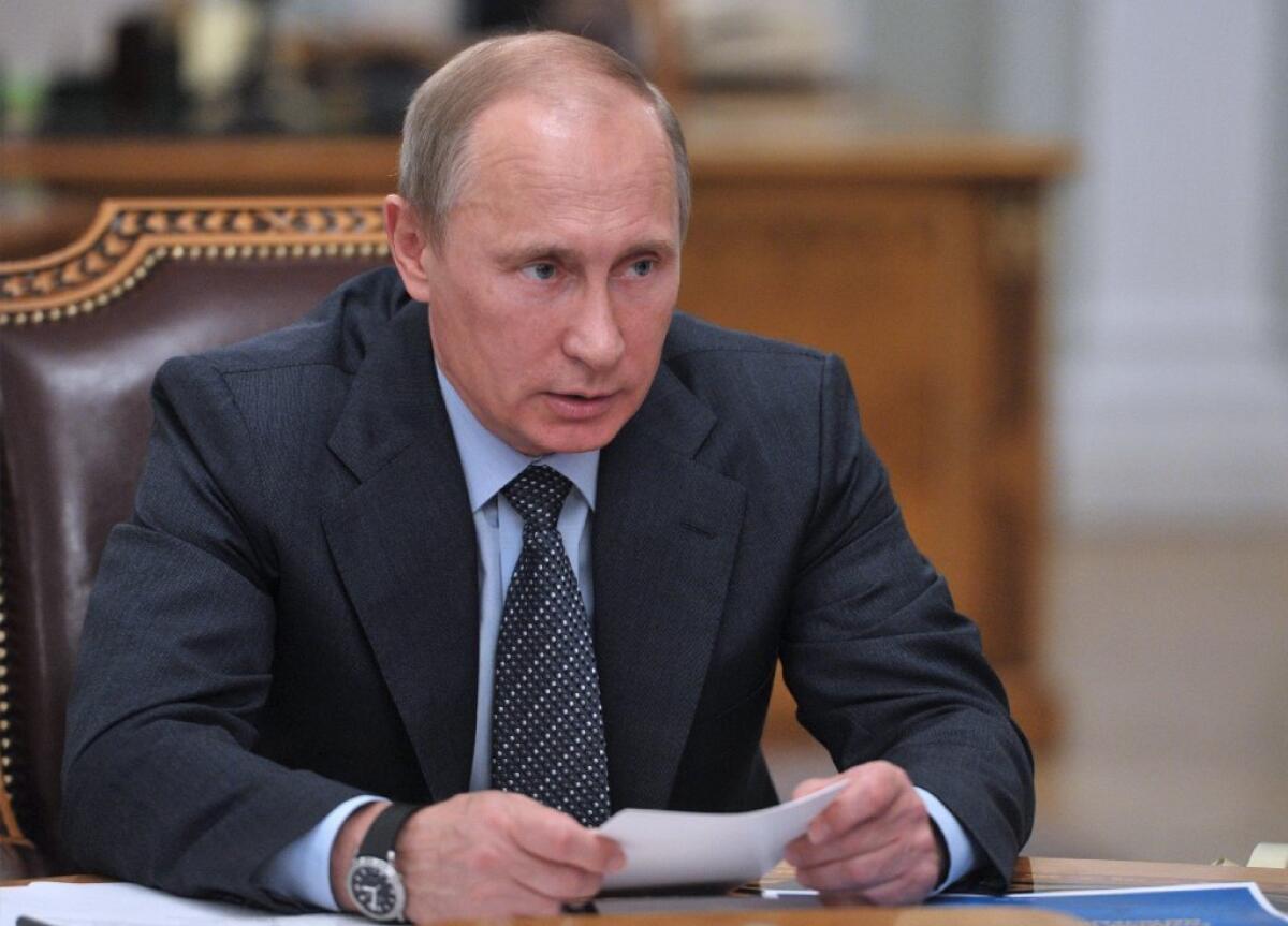 Russian President Vladimir Putin speaking in Moscow in July.