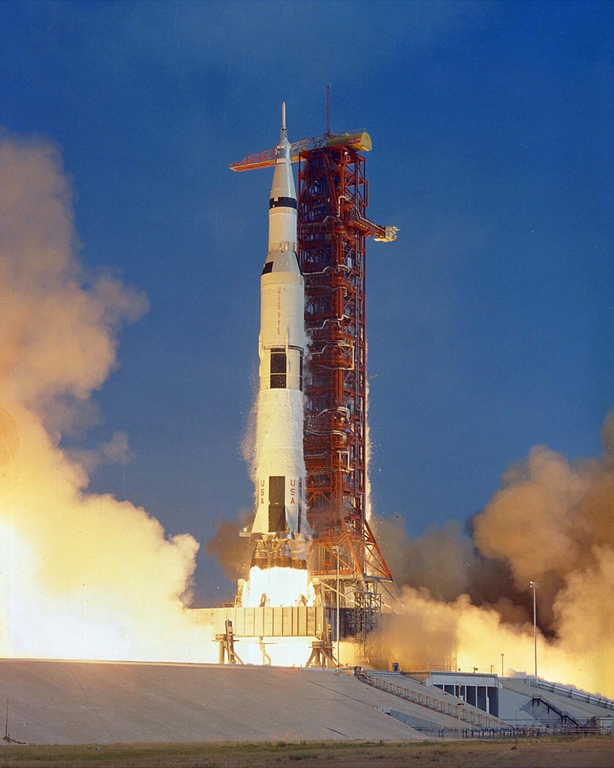 The Apollo 11 Saturn V space vehicle lifts off with astronauts Neil Armstrong, Michael Collins and Edwin "Buzz" Aldrin in 1969. (NASA)