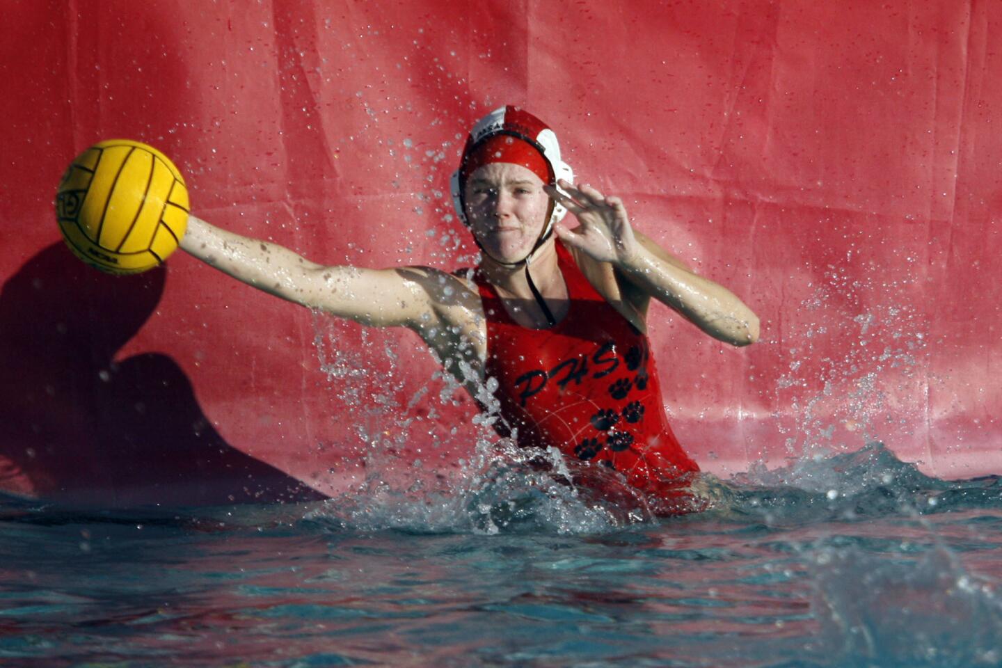 Pasadena's Savannah Woods tries to block a shot, but misses during a match against Glendale at Glendale High School on Tuesday, January 8, 2013.