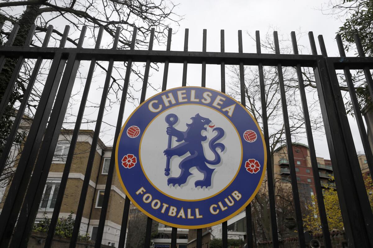 A sign on the gate at Chelsea's Stamford Bridge stadium March 13 in London. The English Premier League is suspended until April 3, and Chelsea's Callum Hudson-Odoi has tested positive for the coronavirus.