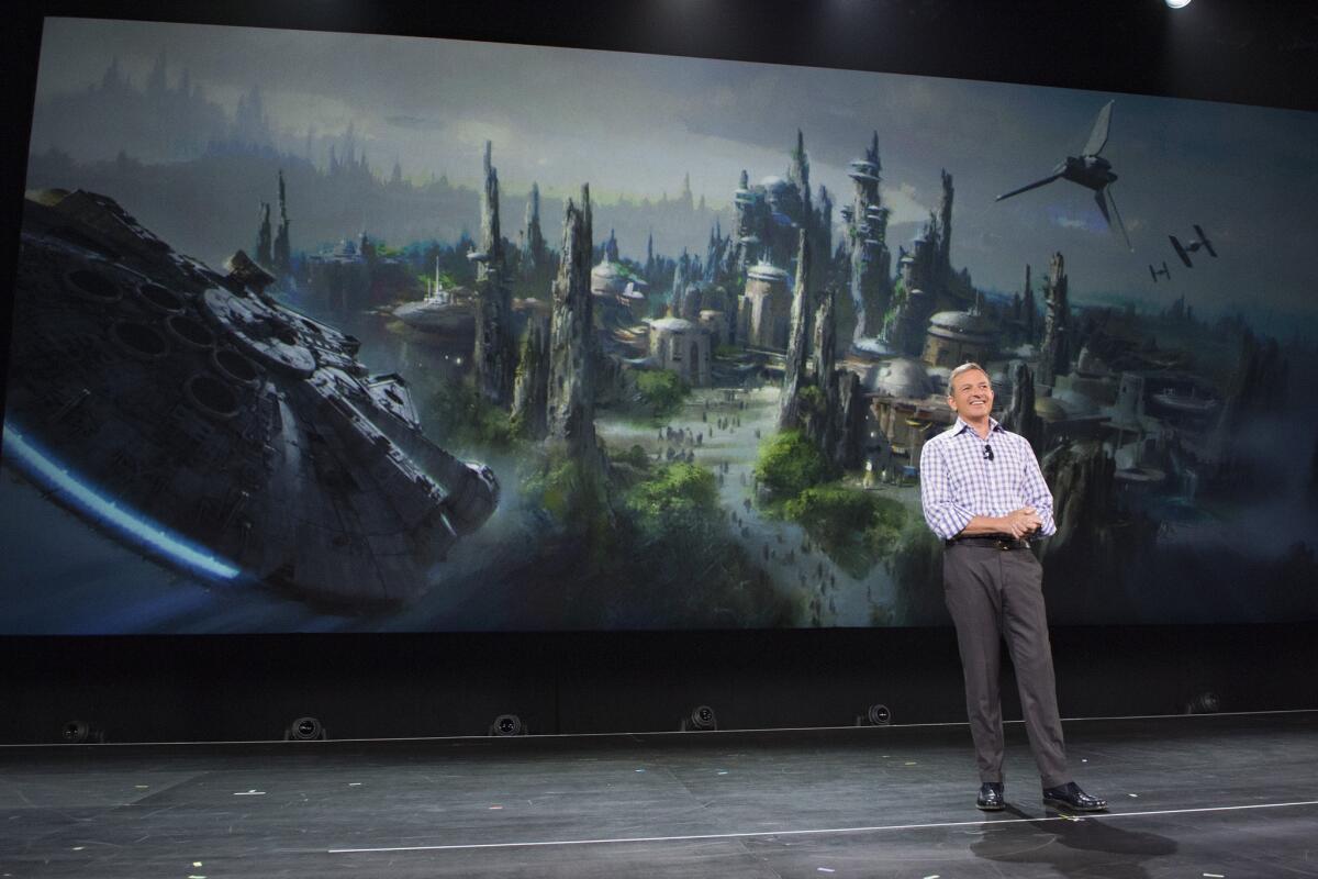 Walt Disney Company Chairman and CEO Bob Iger announces that Star Wars-themed lands will be coming to Disney parks in Anaheim and Orlando.