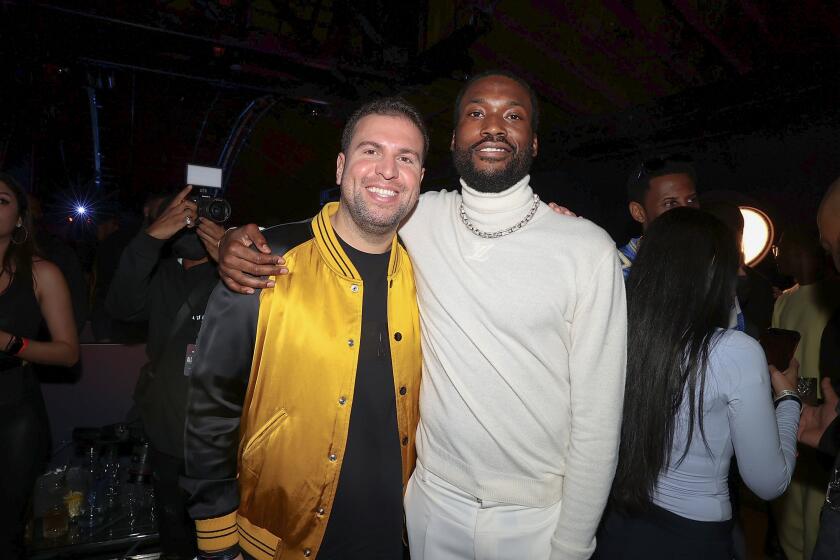 Richard Saghian and Meek Mill attend Fanatic Super Bowl Party on February 12, 2022 in Culver City, California