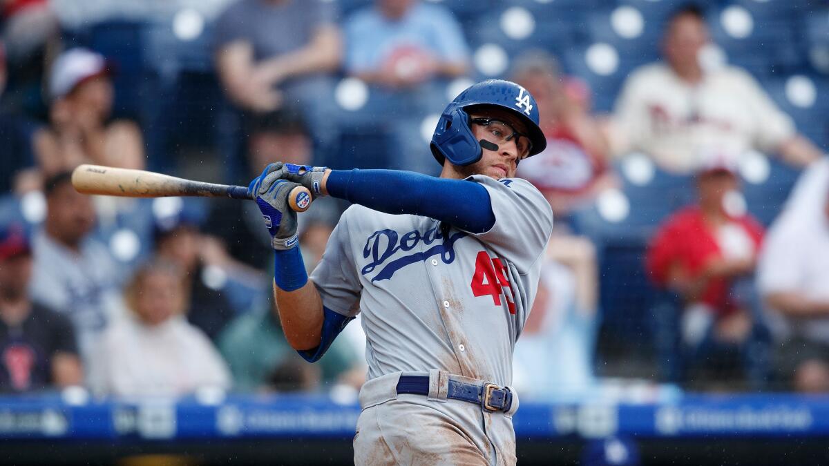 The Dodgers' Matt Beaty swings during an at-bat against the Philadelphia Phillies on July 18.
