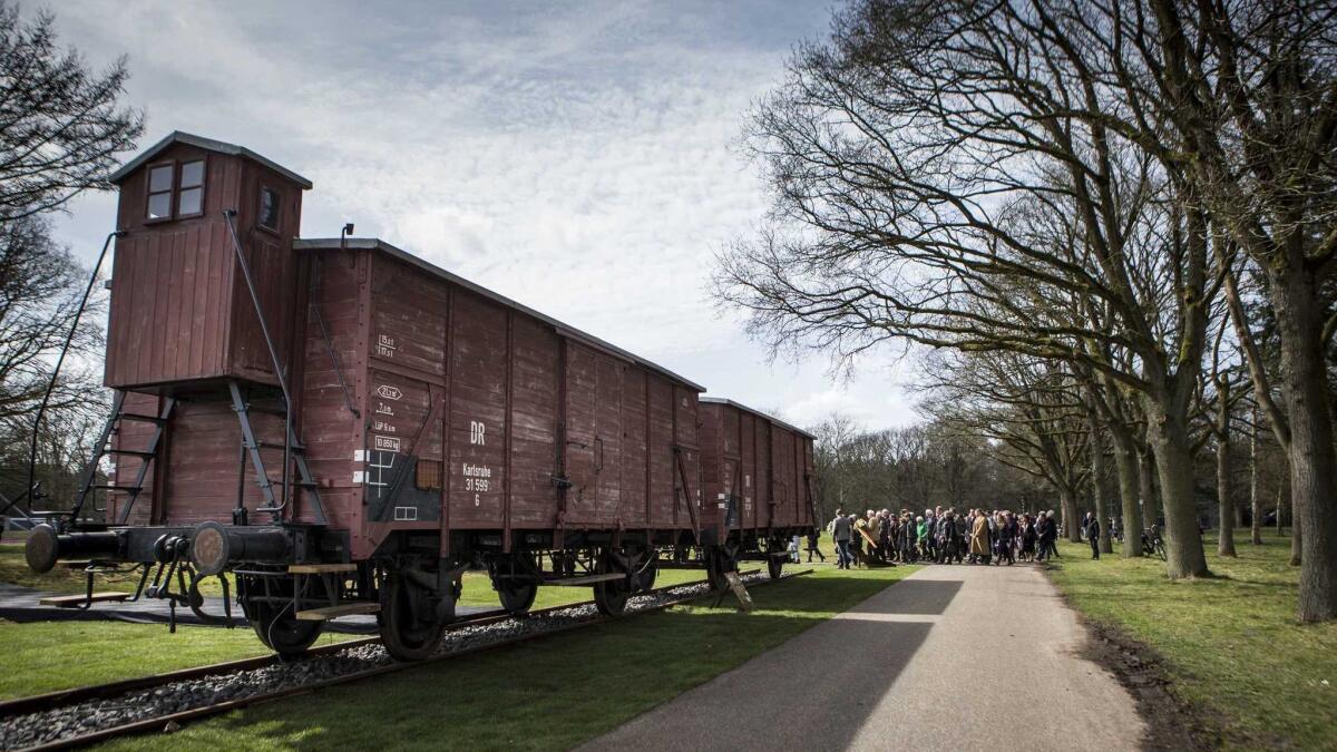 Original rail cars that carried Jews to Nazi deaths camps during World War II are displayed at a memorial center in the Netherlands. A new analysis of train records suggests that over a three-month period in 1942, the Nazis murdered more than 14,000 Jews a day at camps in Poland.