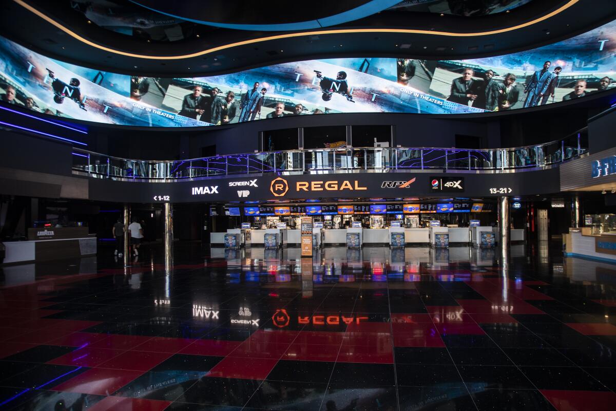 Regal Irvine Spectrum's remodeled lobby features a digital ribbon display to promote new movies.