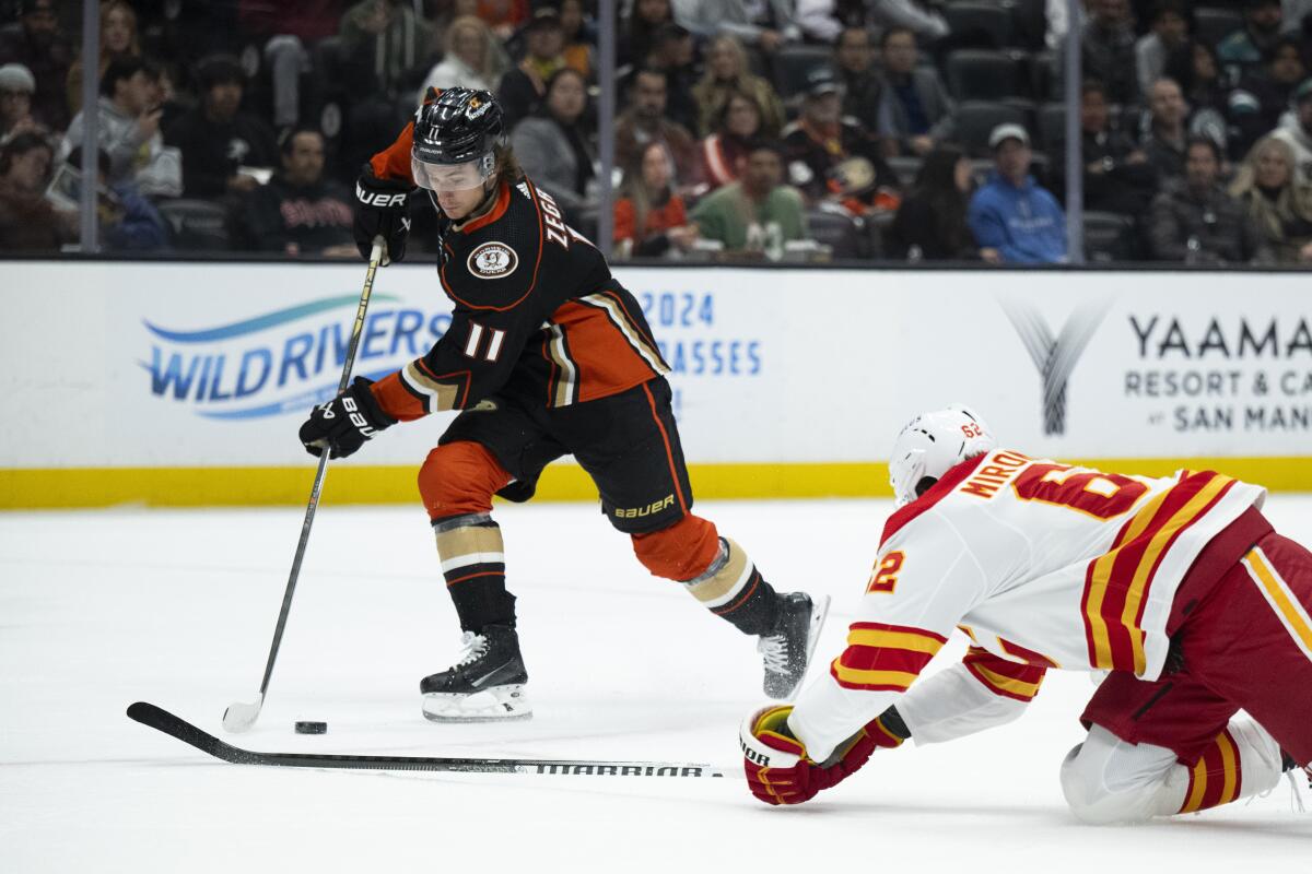 Ducks can’t hold back Calgary Flames and lose in their home finale