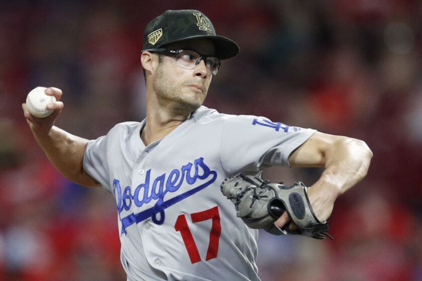 CINCINNATI, OH - MAY 17: Joe Kelly #17 of the Los Angeles Dodgers pitches in the ninth inning against the Cincinnati Reds at Great American Ball Park on May 17, 2019 in Cincinnati, Ohio. The Dodgers won 6-0. (Photo by Joe Robbins/Getty Images) ** OUTS - ELSENT, FPG, CM - OUTS * NM, PH, VA if sourced by CT, LA or MoD **