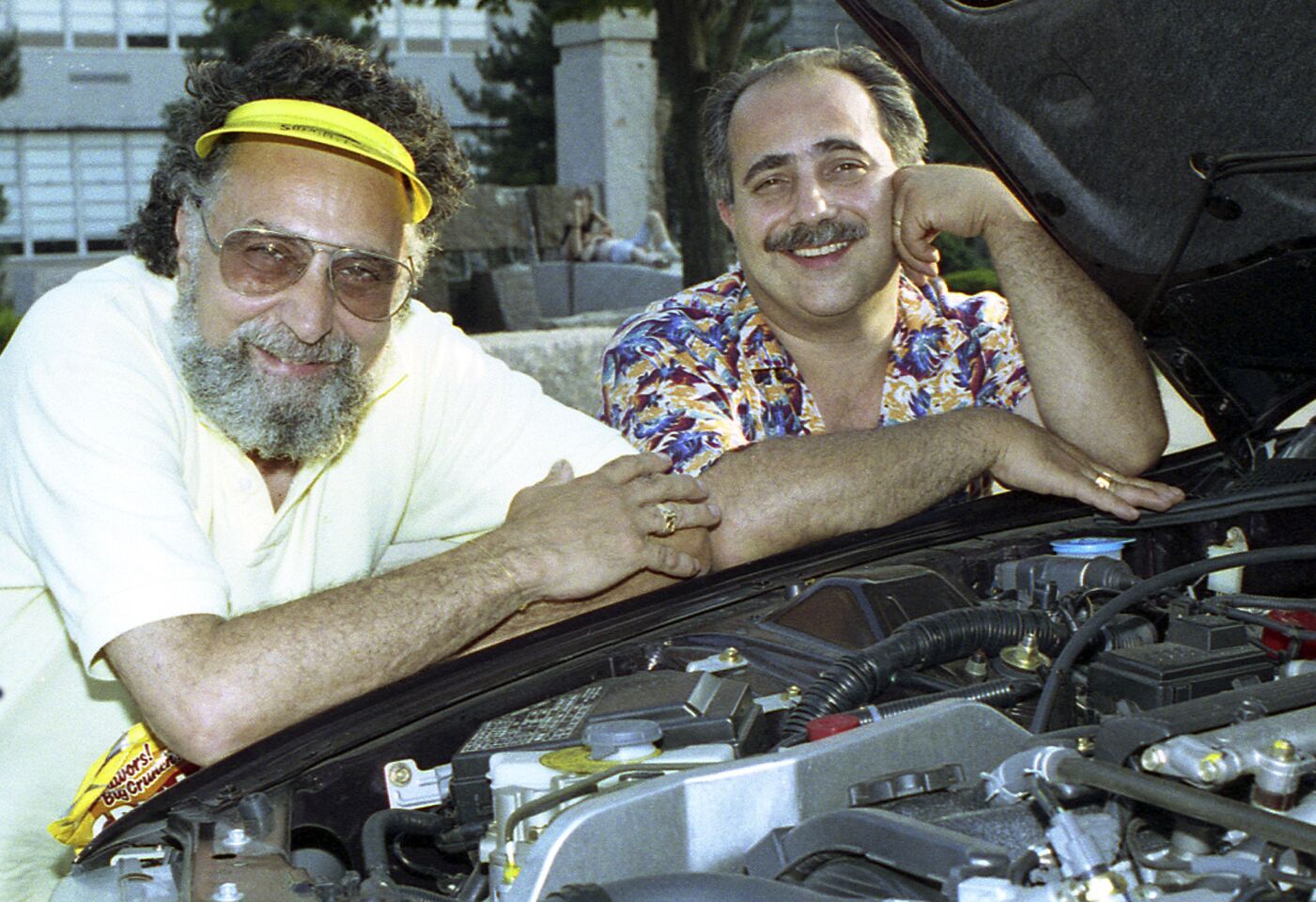 Tom Magliozzi, left, along with his brother Ray, for more than 35 years dispensed frequently good advice on "Car Talk," one of NPR's most popular and least serious programs. Tom Magliozzi was 77.