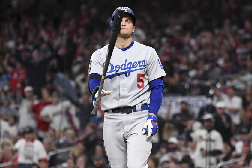 Atlanta, GA - October 23: Los Angeles Dodgers' Corey Seager reacts after striking out during the sixth inning.