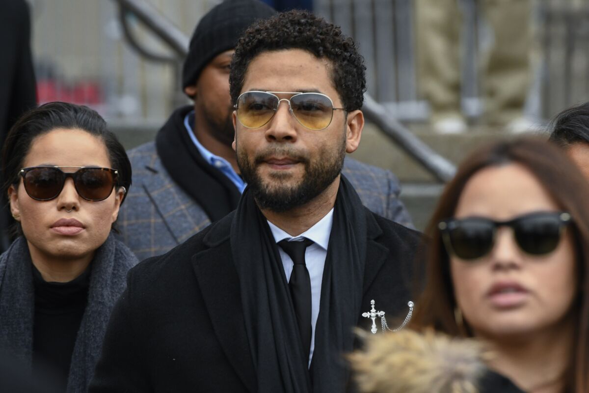 FILE - In this Feb. 24, 2020 file photo, former "Empire" actor Jussie Smollett leaves the Leighton Criminal Courthouse in Chicago. A judge on Friday, Oct. 15, 2021, denied a last-ditch effort to dismiss a criminal case against actor Jussie Smollett, who is accused of lying to police when he reported that two masked men attacked him in downtown Chicago. (AP Photo/Matt Marton, File)
