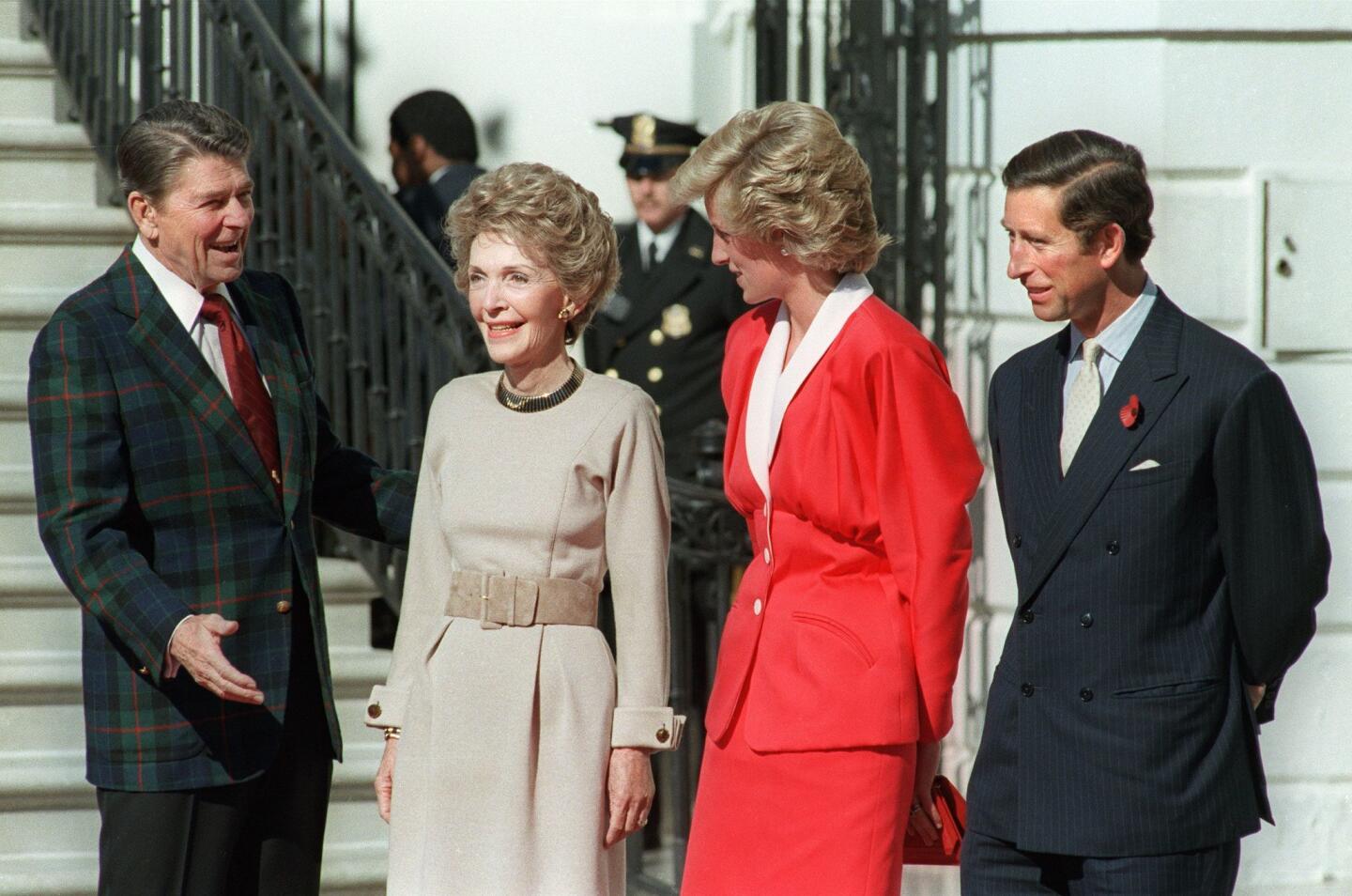 This file photo taken on November 9, 1985 shows (L-R) US President Ronald Reagan and US First Lady Nancy Reagan welcoming to the White House Princess Diana and her husband Prince Charles.