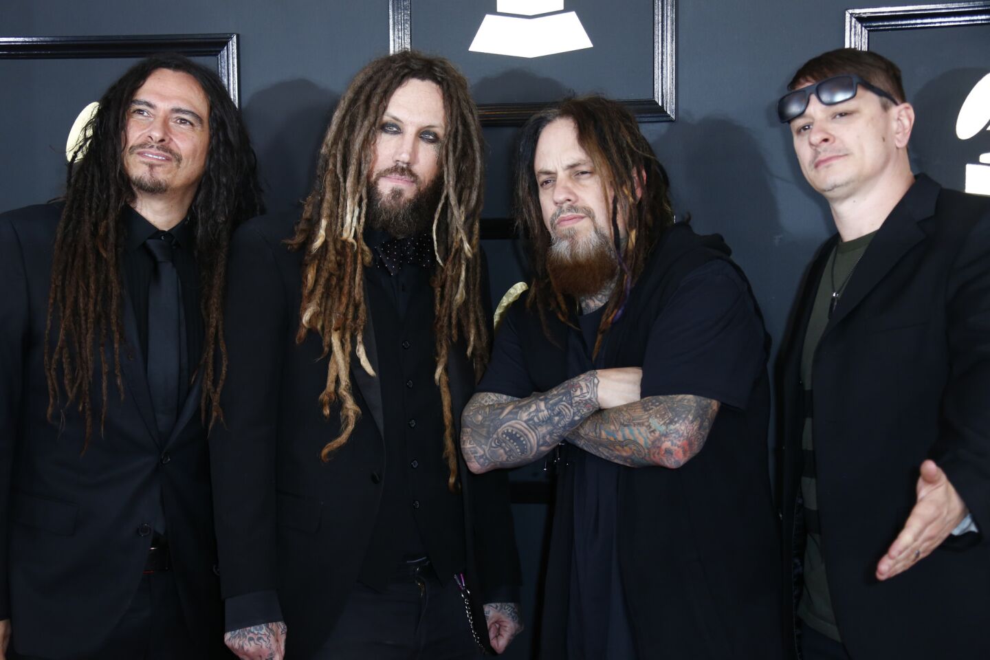 The band Korn arrives at the 59th Grammy Awards.