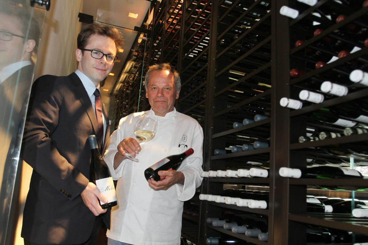 Chef Wolfgang Puck with Sommelier Chris Miller in the new wine cellar at Spago.