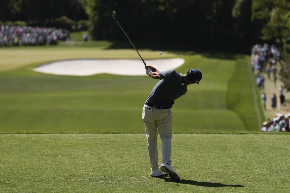 Collin Morikawa hits from the fourth tee during the final round of the Masters on Sunday.