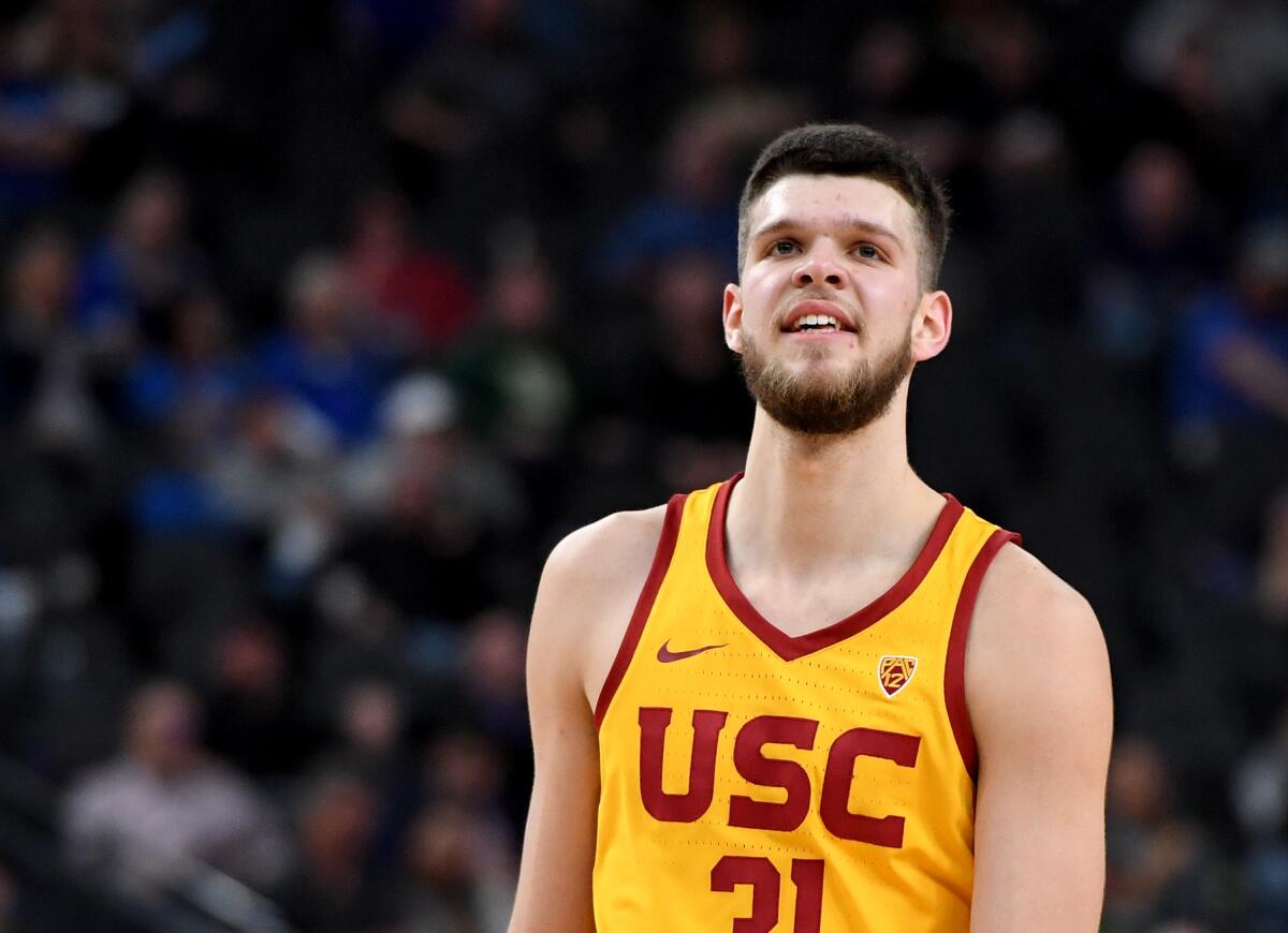 USC's Nick Rakocevic smiles during a Pac-12 tournament game March 9, 2018, in Las Vegas.