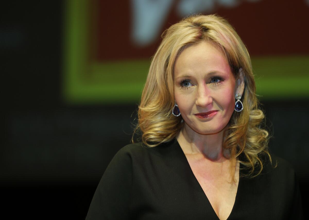 J.K. Rowling poses for photographers during the unveiling of her book "The Casual Vacancy" at the Southbank Center in London on Sept. 27, 2012.