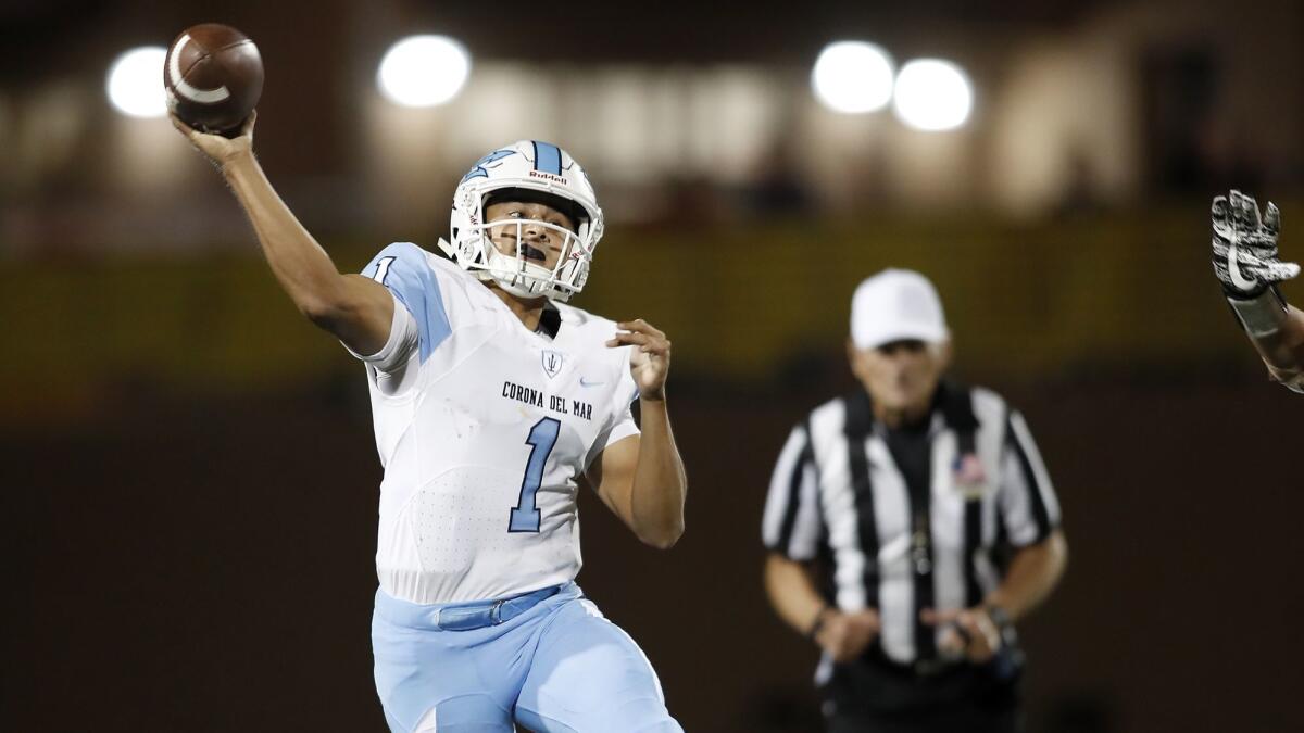 Corona del Mar's Nathaniel Espinoza (1) throws the ball during the first half against Woodbridge in the Pacific Coast League championship game on Nov. 3, 2017.