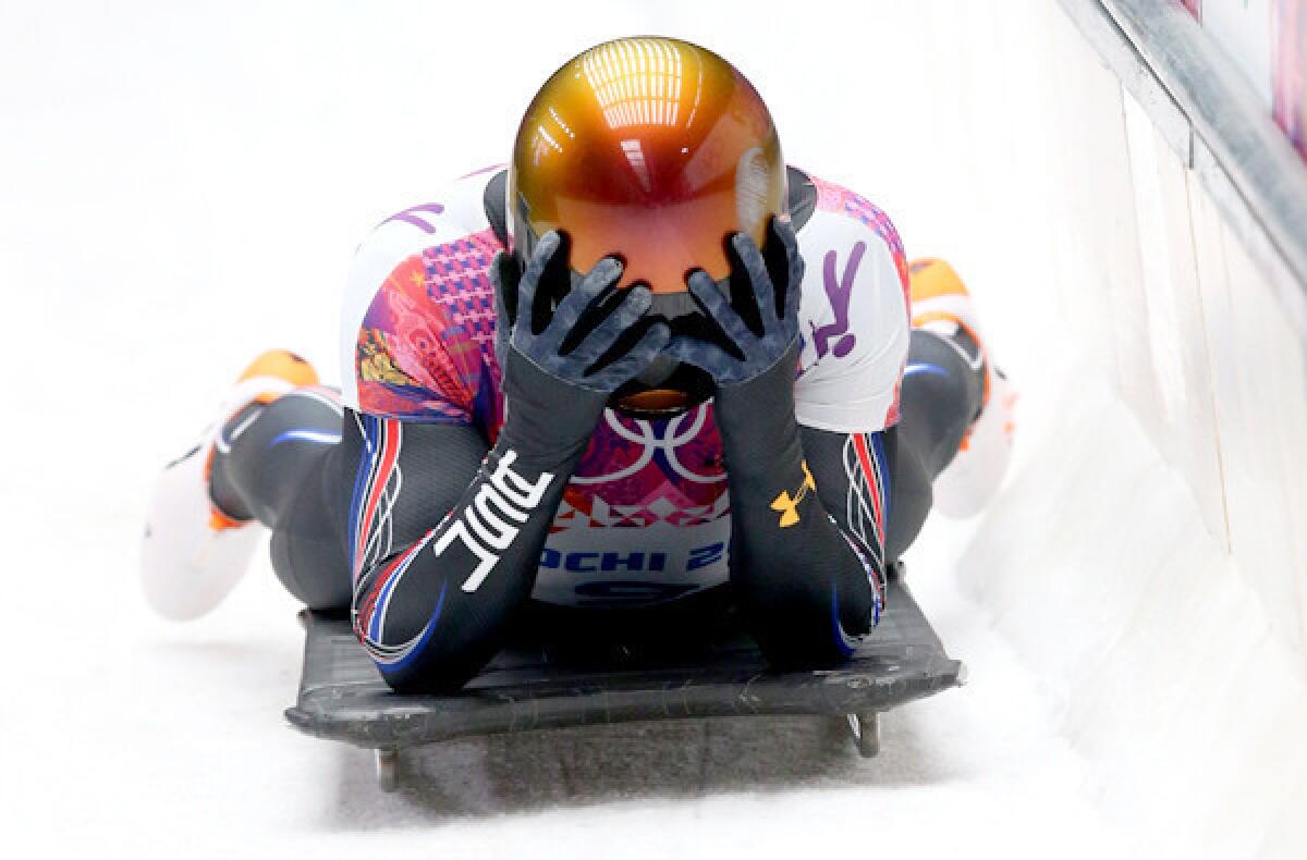 American slider John Daly reacts after his final skeleton run on Saturday at the Sochi Olympics, where he fell from fourth to 13th after a bad start.