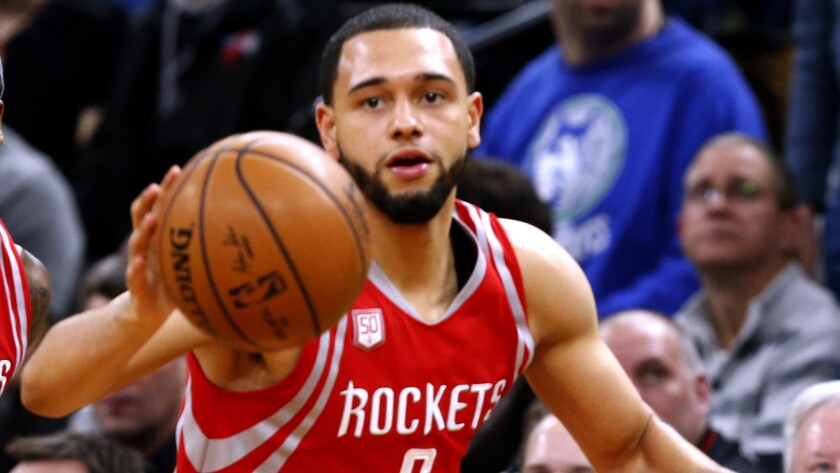 Tyler Ennis, a 22-year-old guard, has been acquired by the Lakers in a trade with the Rockets.