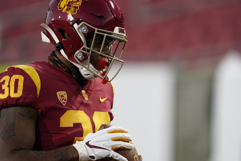 Southern California running back Markese Stepp (30) warms up before an NCAA college football game for the Pac-12 Conference championship against Oregon Friday, Dec 18, 2020, in Los Angeles. (AP Photo/Ashley Landis)