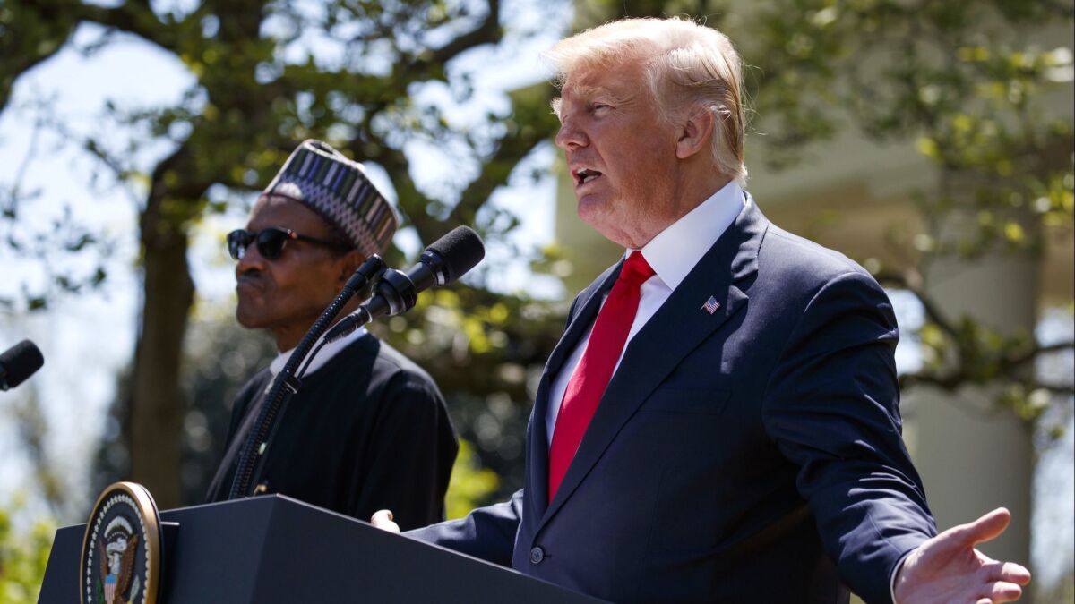 President Trump speaks during a news conference with President Muhammadu Buhari of Nigeria in the White House Rose Garden on Monday.