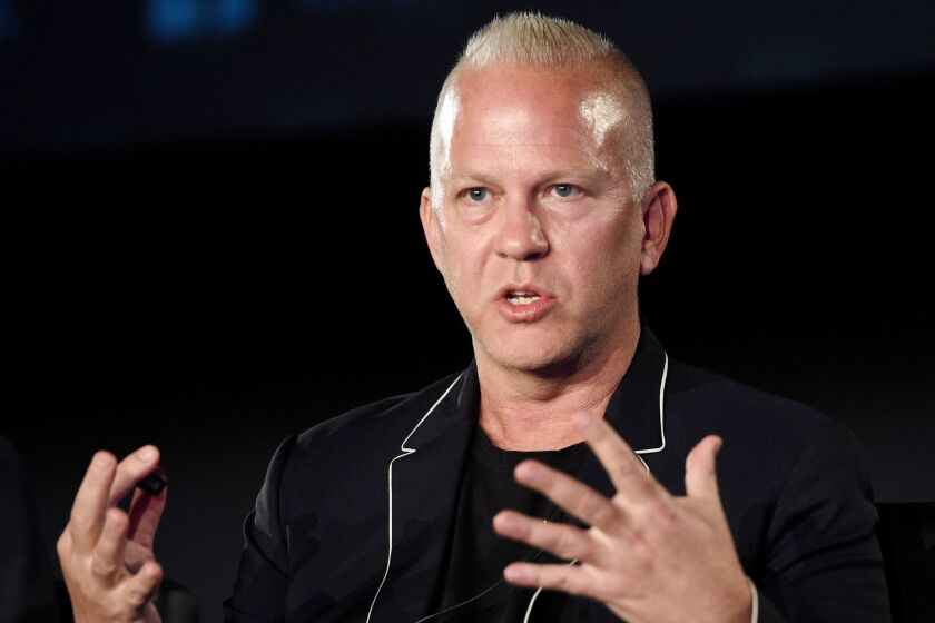 FILE - In this Aug. 9, 2017 file photo, Ryan Murphy, the executive producer/writer/director of "The Assassination of Gianni Versace: American Crime Story," takes part in a panel discussion on the FX series during the 2017 Television Critics Association Summer Press Tour in Los Angeles. Murphy is expanding his empire to Netflix. The streaming service says Murphy signed a deal to produce new series and films exclusively for it starting in July. (Photo by Chris Pizzello/Invision/AP, File)