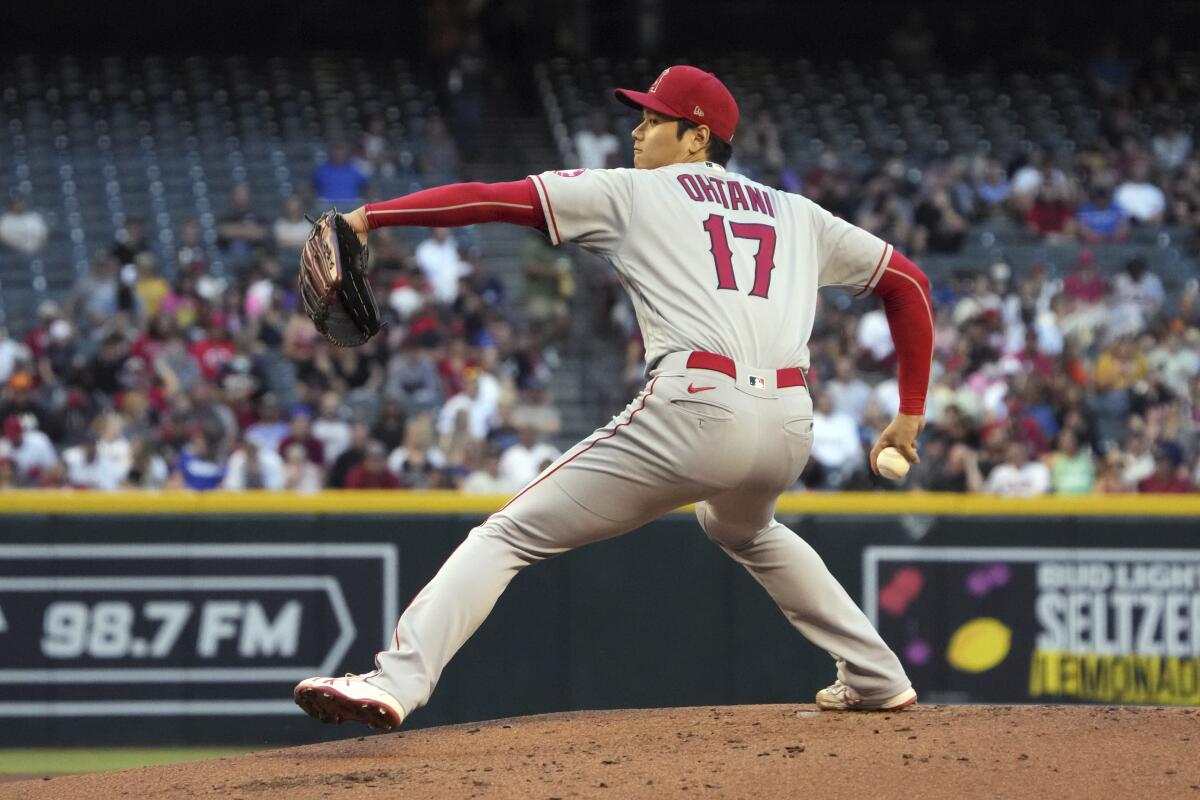 Los Angeles Angels pitcher Shohei Ohtani throws against the Arizona Diamondbacks in the first inning during a baseball game, Friday, June 11, 2021, in Phoenix. (AP Photo/Rick Scuteri)