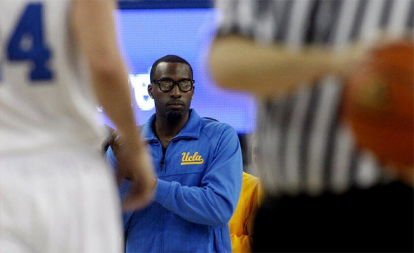 Shabazz Muhammad watches from the bench as the Bruins play against Indiana State.