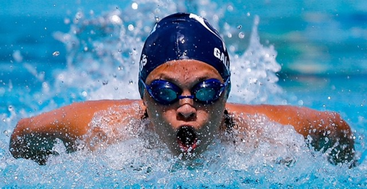 Palisades' Rosalin Gallegos competes in the 100 butterfly.