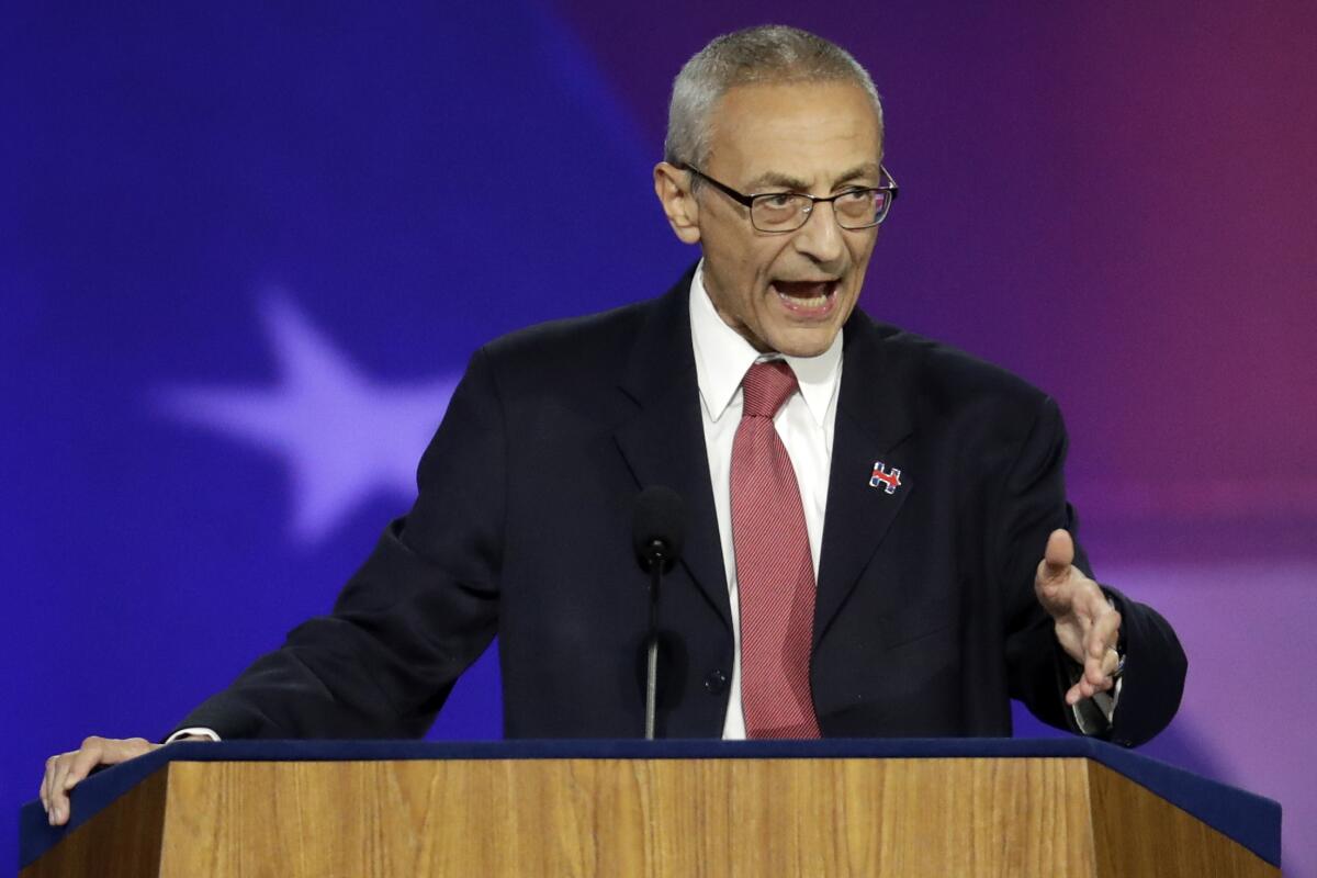 FILE- John Podesta, Hillary Clinton campaign chairman, announces that Clinton will not be making an appearance at Jacob Javits Center in New York on Nov. 9, 2016. President Joe Biden has brought back Podesta, a veteran of past Democratic administrations, to put in place the climate part of the Inflation Reduction Act. Biden on Sept. 2, 2022, put Podesta in charge of shaping the administration's ambitious climate package, newly invigorated by $370 billion from Congress. (AP Photo/Patrick Semansky, File)