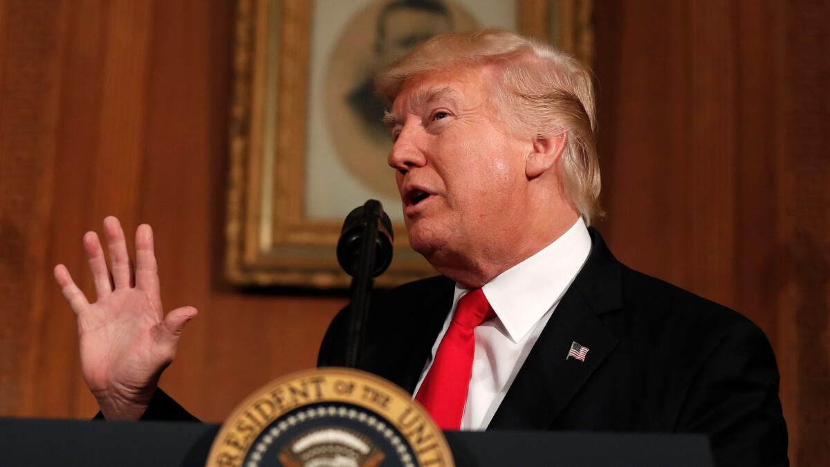 President Trump speaks at the Interior Department in Washington on April 26. The president is proposing dramatically reducing the taxes paid by corporations big and small.