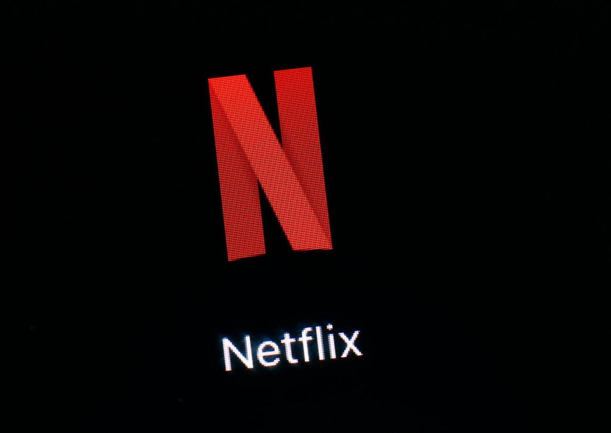 ARCHIVO - Esta foto del 19 de marzo del 2018 muestra el app de Netflix en una iPad en Baltimore. Las acciones de Netflix abrieron el martes, 24 de septi9embre del 2019, en territorio negativo para el año — la primera vez que eso sucede desde el 2016 _, en momentos en que grandes compañías de los medios ingresan al streaming para competir por subscriptores.