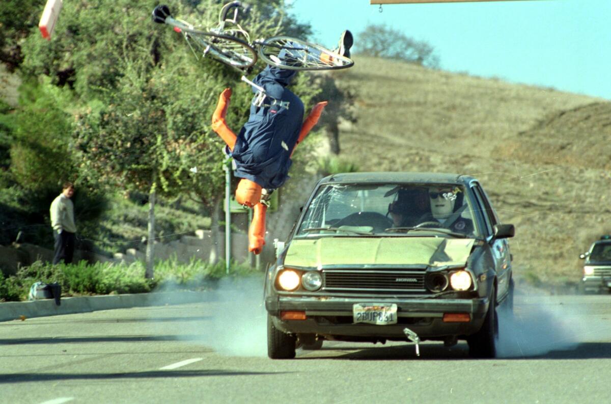 Test dummy flies through the air in simulated crash of car into cyclist. California leads the nation in cycling traffic deaths, according to a new report from the Governors Highway Safety Assn.