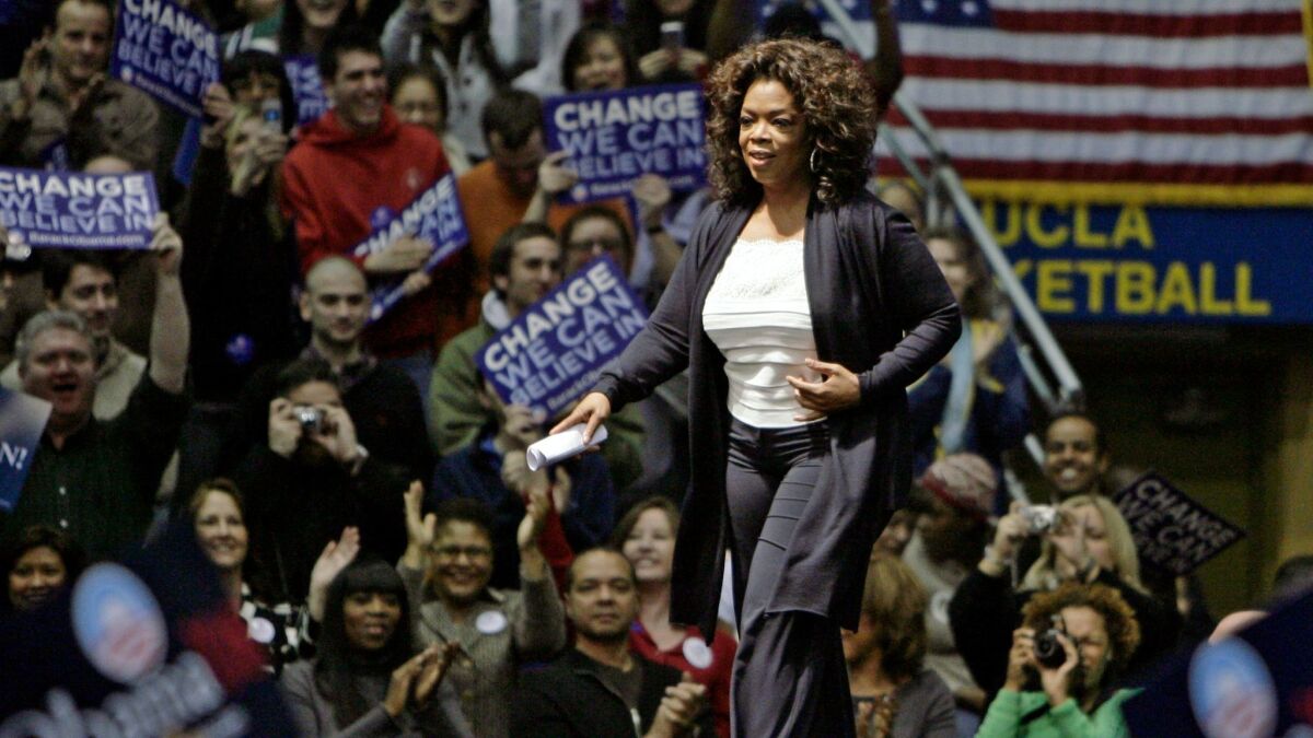 Oprah Winfrey campaigns for Democratic presidential hopeful Barack Obama at a rally in Los Angeles on Feb. 3, 2008.