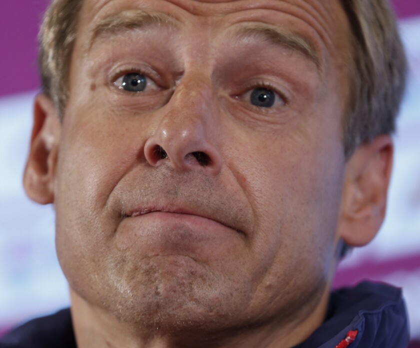 File---In this Wednesday, June 11, 2014 file photo, at this time United States' head coach Juergen Klinsmann attends a news conference before a training session at the Sao Paulo FC training center in Sao Paulo, Brazil. (AP Photo/Julio Cortez)