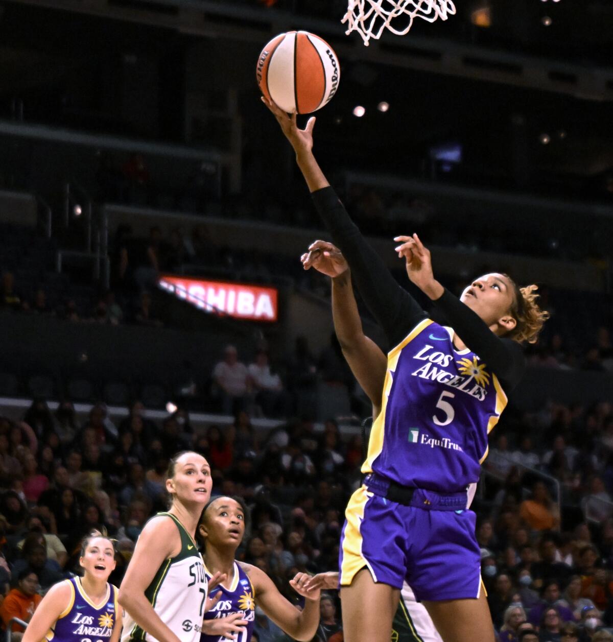 Los Angeles Sparks guard Kianna Smith drives to the basket against the Seattle Storm during the second half of a WNBA basketball game Thursday, July 7, 2022, in Los Angeles. (Keith Birmingham/The Orange County Register via AP)