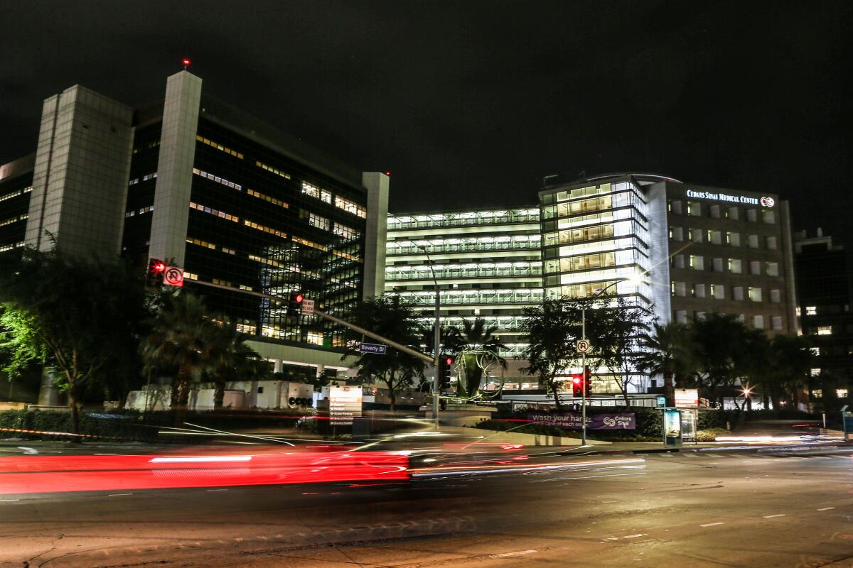 The exterior of a hospital at night