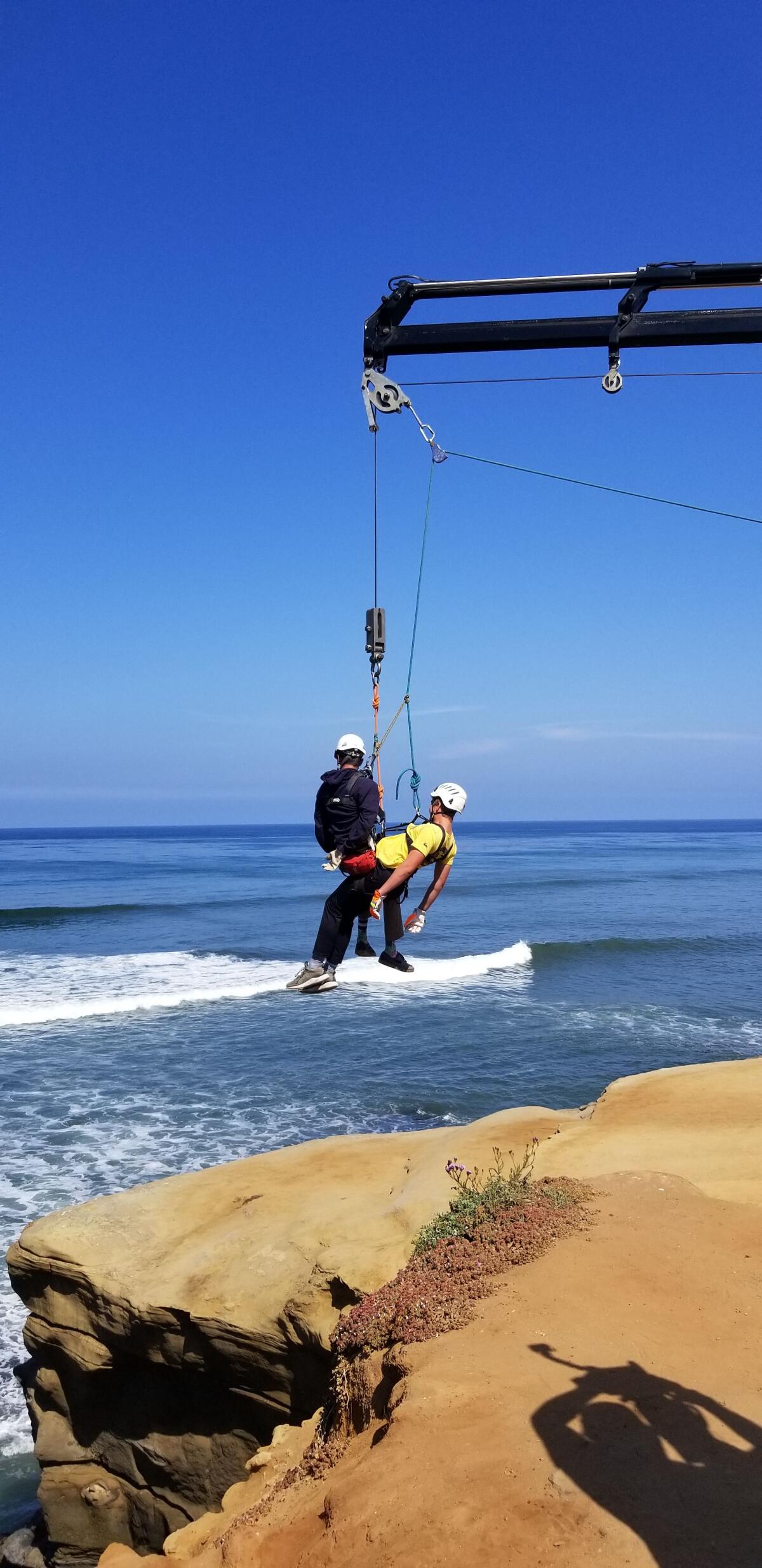 Jack and Maxwell hang in there during the cliff-rescue simulation.