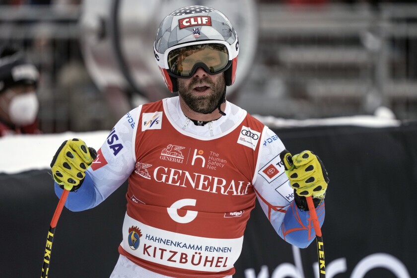 United States' Travis Ganong gets to the finish area after completing an alpine ski, men's World Cup downhill, in Kitzbuehel, Austria, Friday, Jan. 21, 2022. (AP Photo/Giovanni Auletta)
