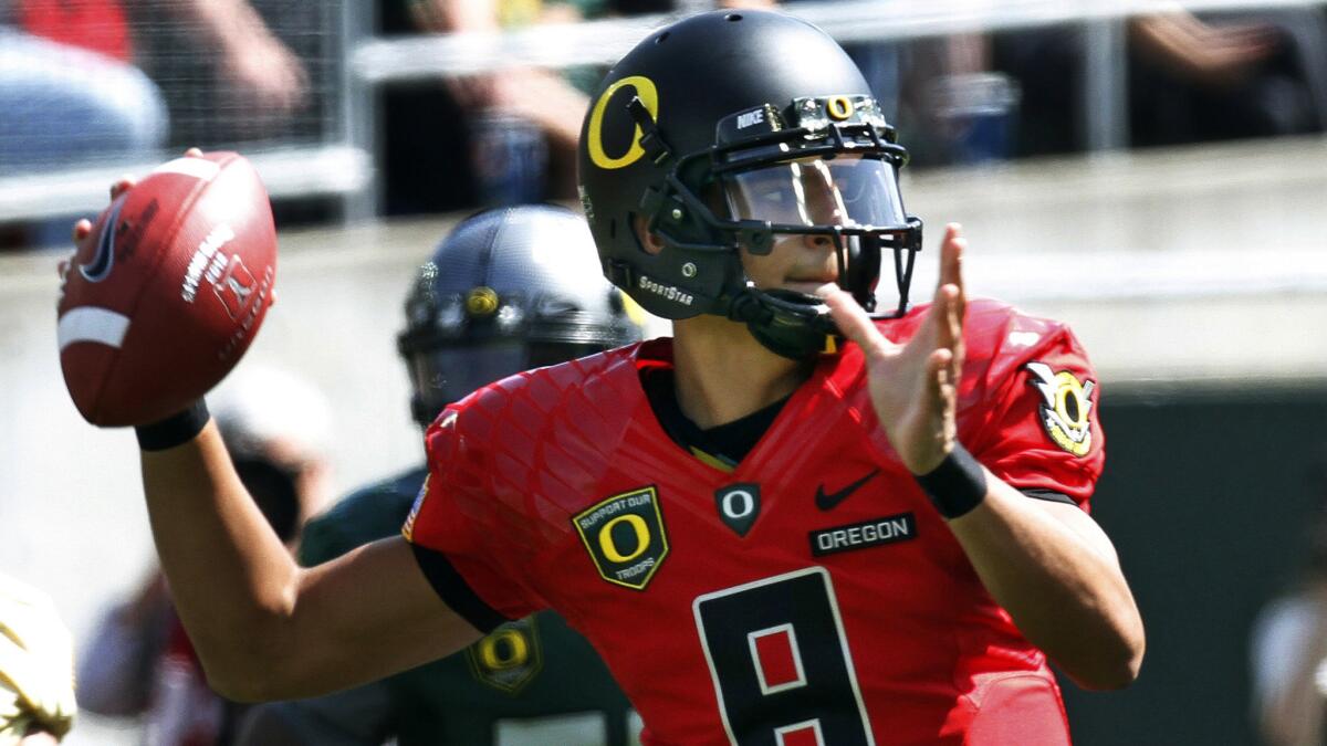 Oregon quarterback Marcus Mariota passes during the Ducks' spring game in April. Oregon is good enough to finally bring home a national title to Eugene.