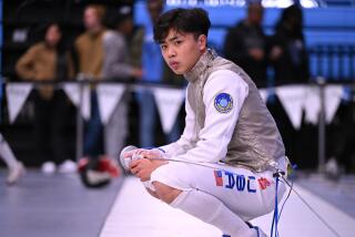 Bryce Louie, a Campbell Hall grad, won the NCAA foil championship as a senior at Penn.