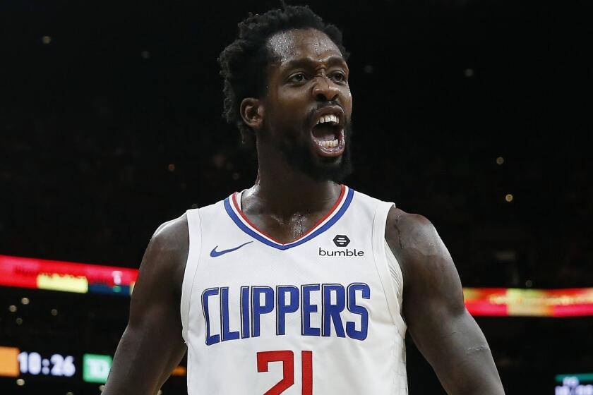 Los Angeles Clippers' Patrick Beverley reacts during the second half of an NBA basketball game against the Boston Celtics in Boston, Saturday, Feb. 9, 2019. (AP Photo/Michael Dwyer)