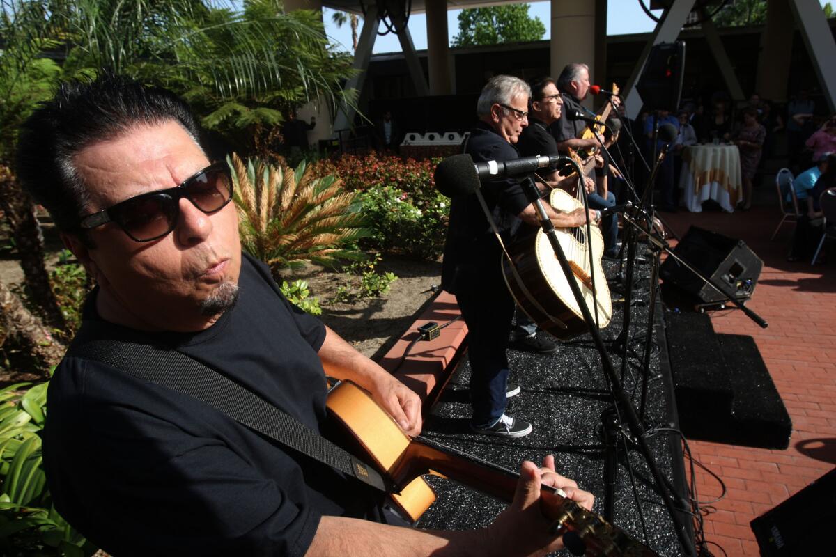 Los Lobos will be the featured act at a day devoted to Johnny Cash.