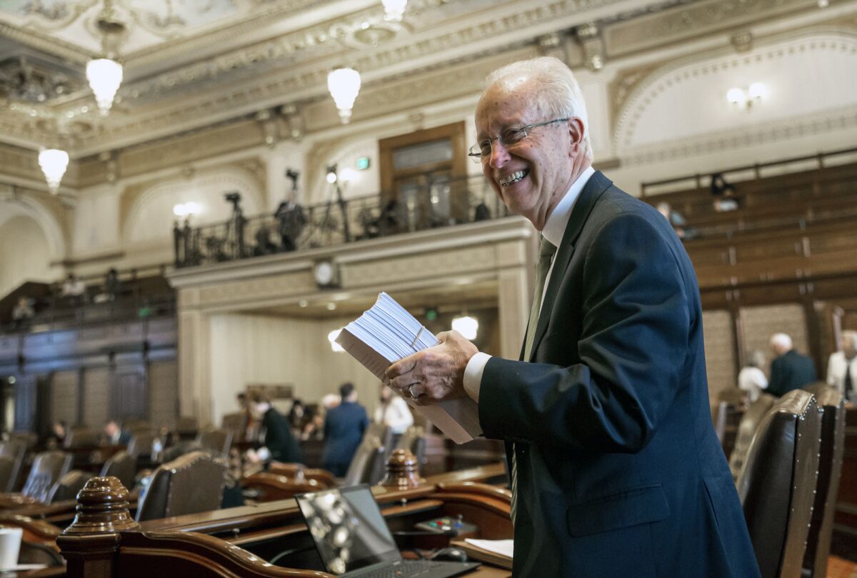FILE - In this June 2, 2019, file photo, former Illinois Sen. Terry Link, D-Vernon Hills, is seen at the Illinois State Capitol in Springfield, Ill. Link pleaded guilty Wednesday, Sept, 16, 2020 to tax evasion in federal court. The Democrat, who resigned last week, had been in office since 1997. He's the latest state legislator to be charged in the federal government's ongoing criminal investigations into public corruption. (Justin L. Fowler/The State Journal-Register via AP File)