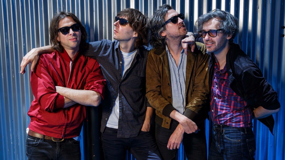 French pop band Phoenix -- Deck D’Arcy, left, Thomas Mars, Christian Mazzalai and Laurent Brancowitz -- in Los Angeles.