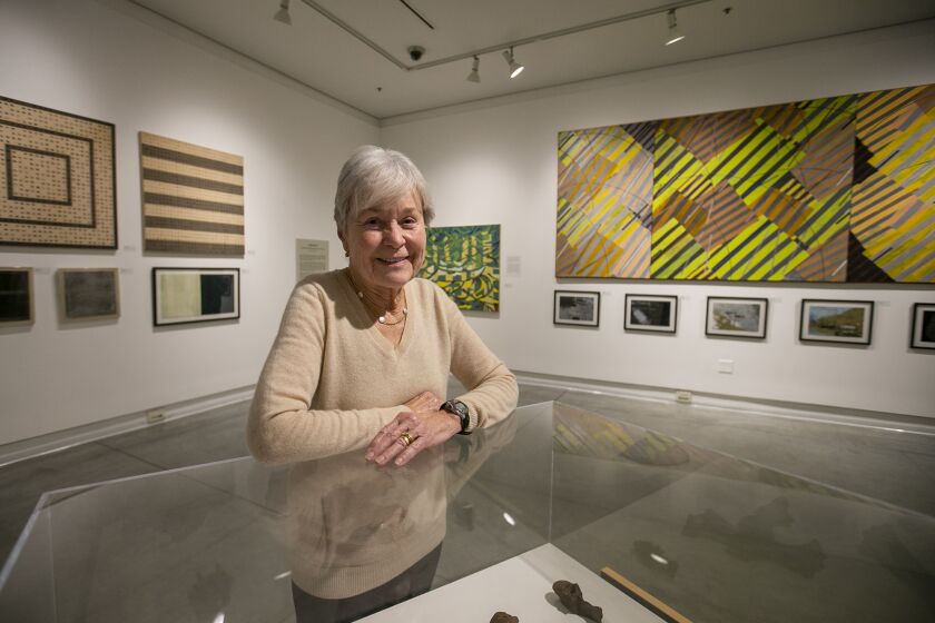 Costa Mesa, CA - February 02: Linda White poses for a portrait during a reception of her exhibition of paintings, drawings, and prints at the Frank M. Doyle Arts Pavilion at Orange Coast College on Thursday, Feb. 2, 2023 in Costa Mesa, CA. (Scott Smeltzer / Daily Pilot)
