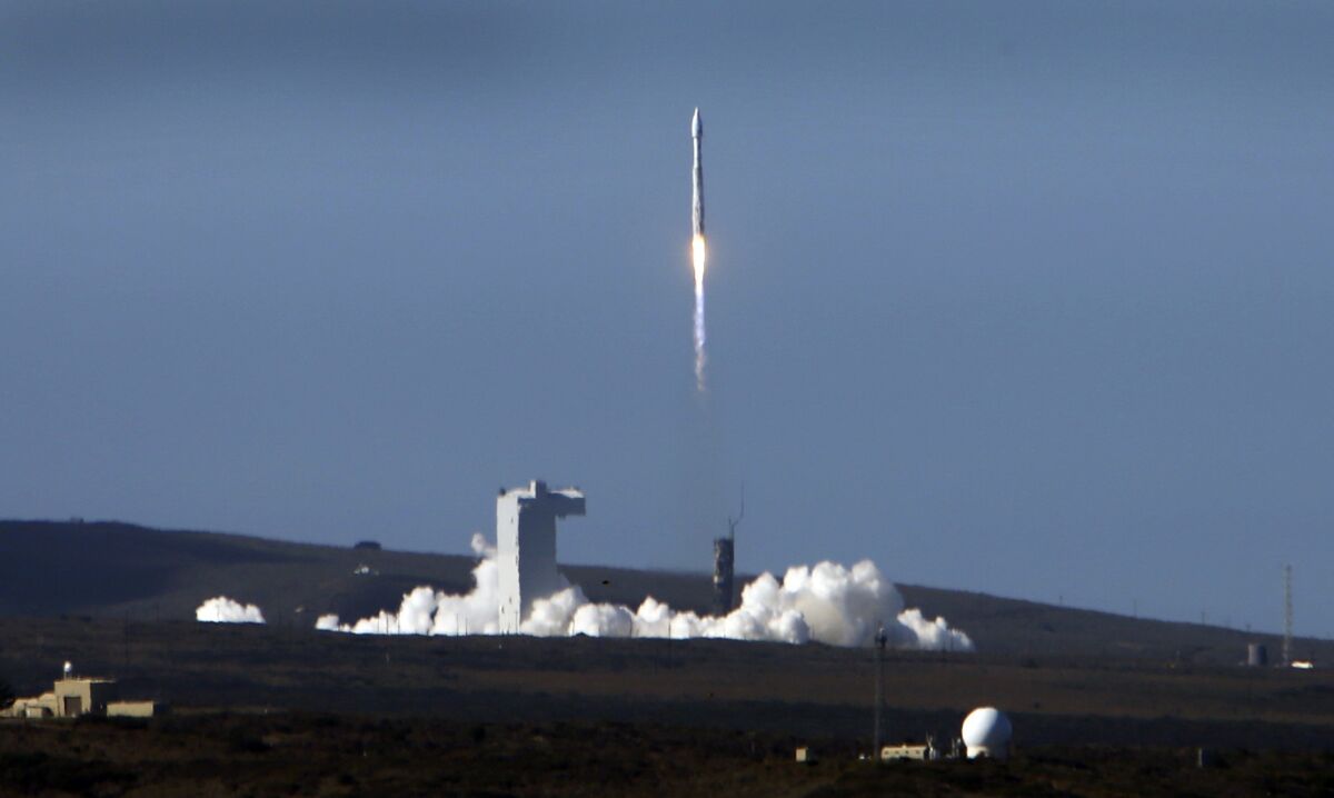 A United Launch Alliance Atlas V rocket carrying a NASA and USGS Landsat 8 satellite launches from at Vandenberg Air Force Base.