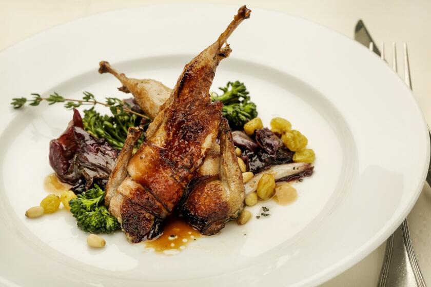At Josie Restaurant, French-trained Josie LeBalch grills quail wrapped in bacon over wood and serves the dainty birds with grilled radicchio sweetened with a splash of balsamic vinegar, along with escarole, golden raisins and toasted pine nuts.