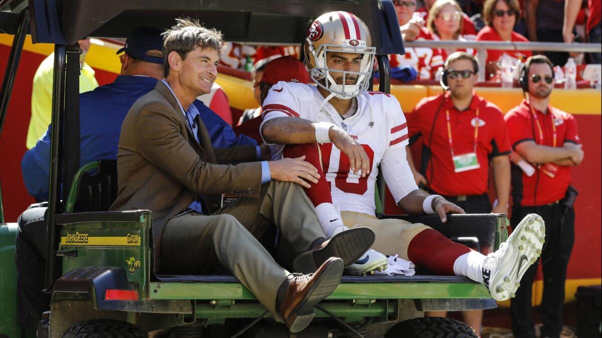 San Francisco quarterback Jimmy Garoppolo is carted off the field after an injury on Sunday.